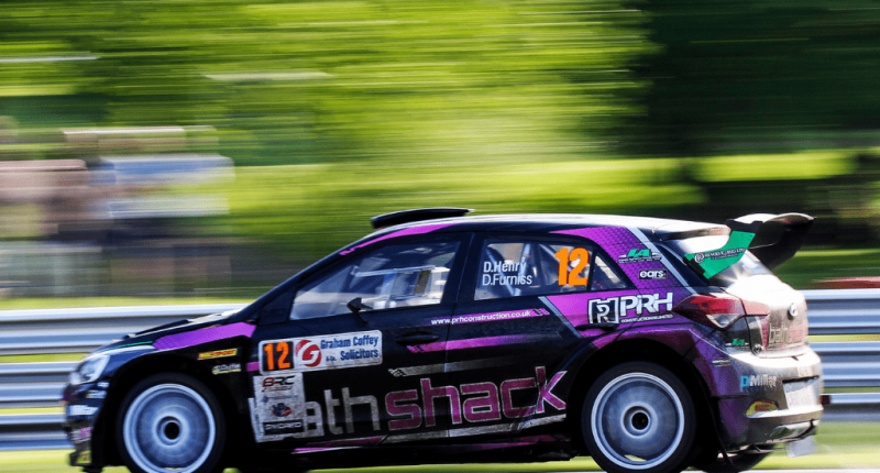 A rally car in action at Oulton Park